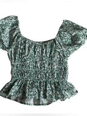 Sim and Sam Marshall’s floral sinched crop top green and white casual summer